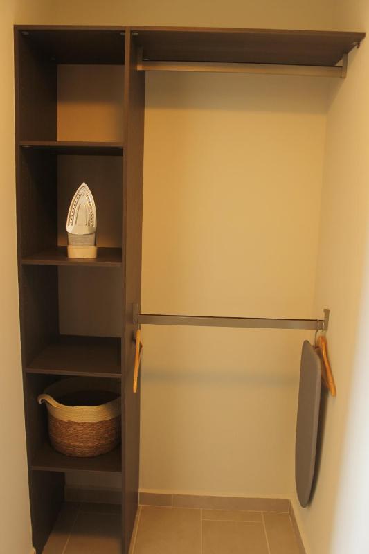 L9 Cozy Stay with Rooftop Gym Access and Coworking - image 11