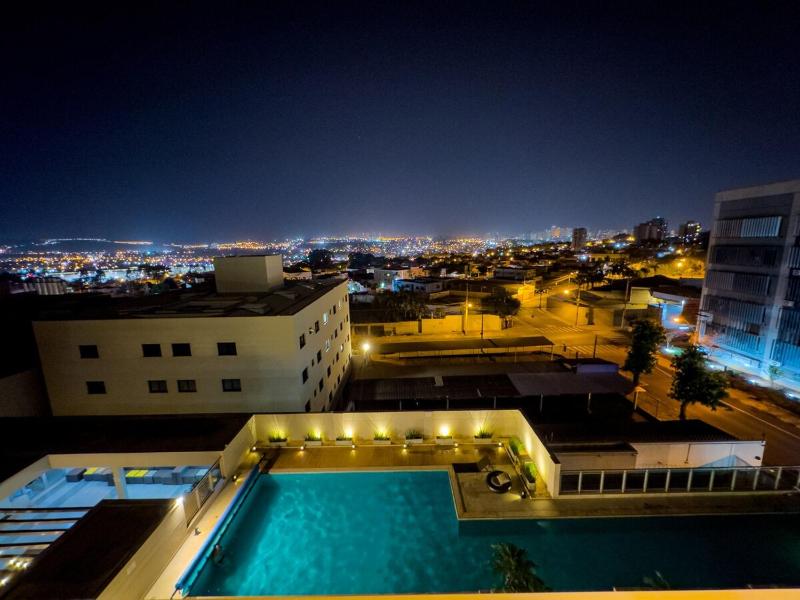 Apartamento no Hub 506 Vista para Piscina - image 12
