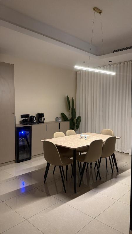 A suite with an elegant and modern design that combines comfort and luxury - image 9