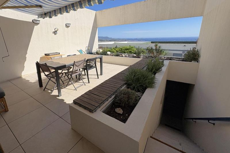Apartment with sea view terrace and swimming pool - image 20