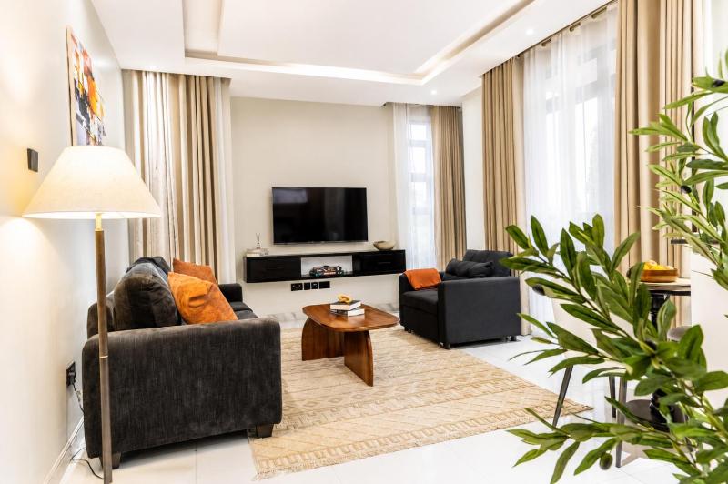 Modern 1BR Near Acacia Mall 24hours Power Free Parking - image 10