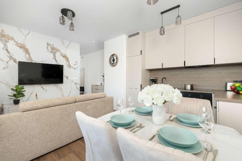 Family Apartment with Parking Close to Spodek by Noclegi Renters - image 25