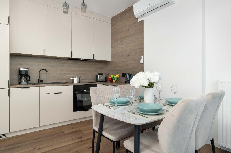 Family Apartment with Parking Close to Spodek by Noclegi Renters - image 41