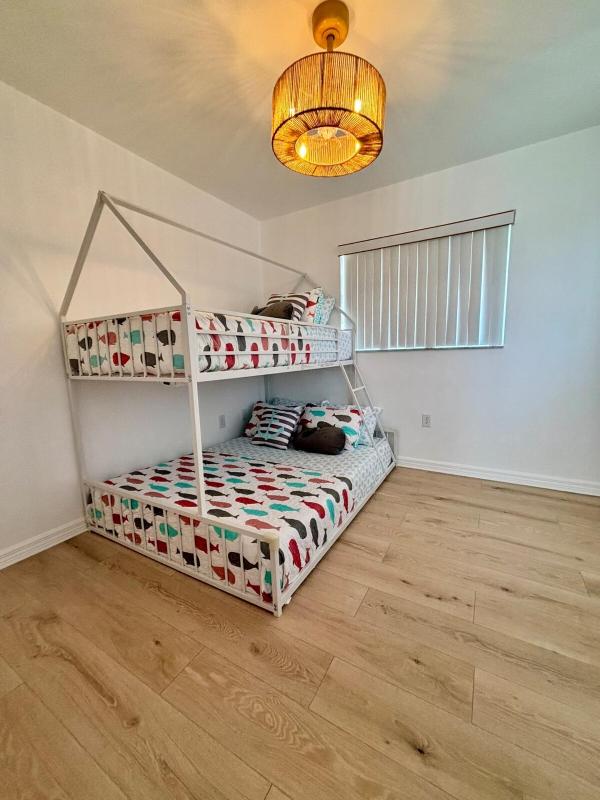 Large Group Getaway | Entire Duplex Walk to Beach - image 11