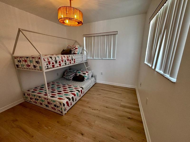Large Group Getaway | Entire Duplex Walk to Beach - image 29