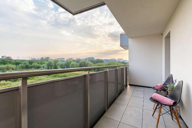 A Unique Apartment with a Loggie in the City Centre by Noclegi Renters - image 3