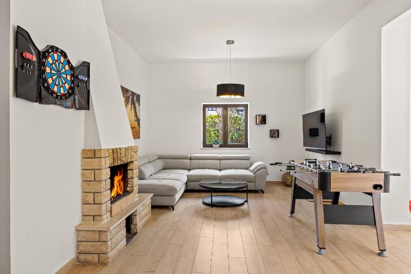 Villa Andrija Family Dream with heated pool at the sea with beautiful garden outside cinema and kids playground - image 45