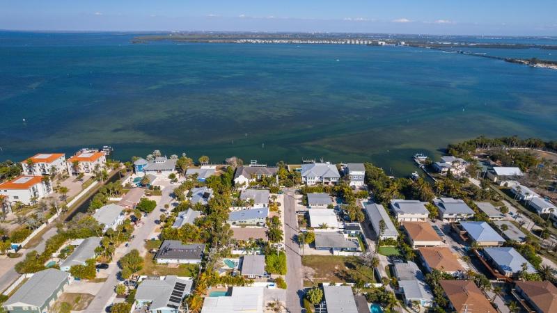 Sea Salt & Sunny Days Pool Spa Putting Green by Anna Maria Life Vacation Rentals - image 22
