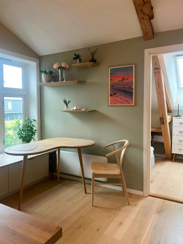 Loft flat with exposed beams and 4 m ceilings - image 13