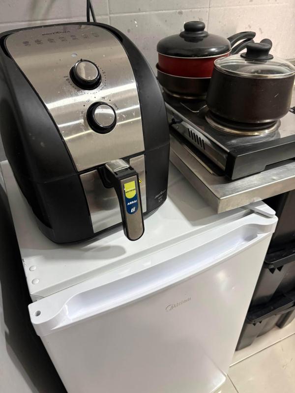 Hospedagem Deoli - suítes cozinha compacta - image 32