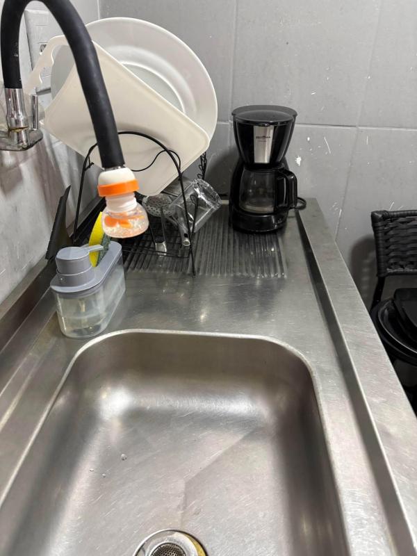 Hospedagem Deoli - suítes cozinha compacta - image 39