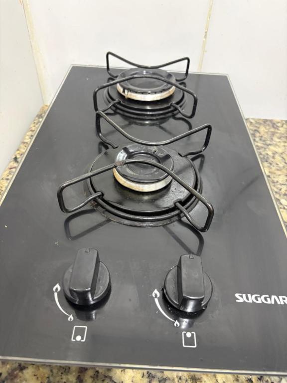 Hospedagem Deoli - suítes cozinha compacta - image 35