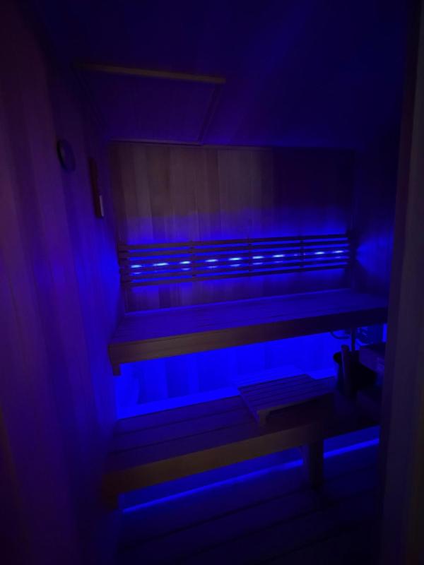 Cozy room with resort-style amenities - image 7