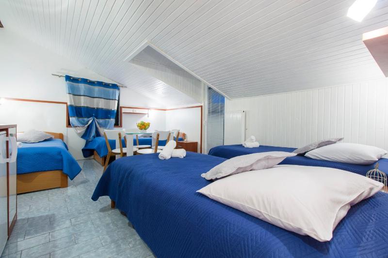 Quadruple Room with Terrace image 1