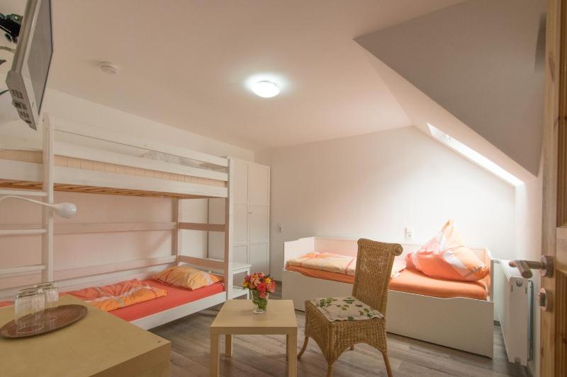 Economy Quadruple Room with Shared Bathroom image 1