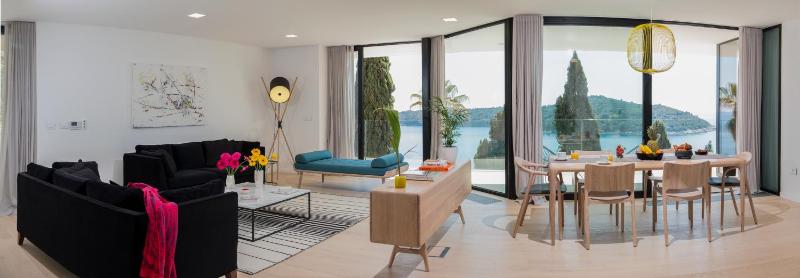Private Entrance - Three-Bedroom Apartment with Balcony and Sea View image 4
