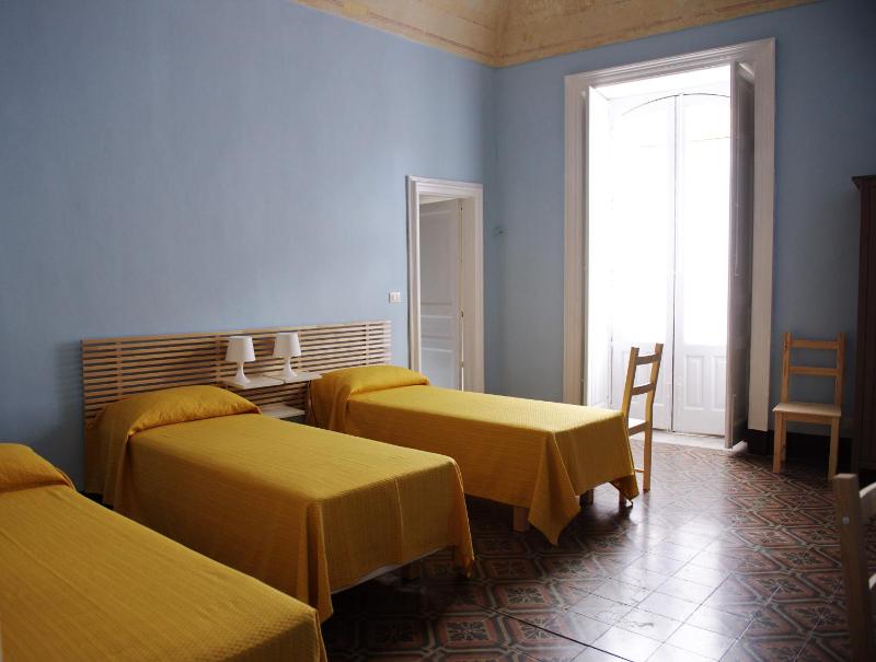 Quadruple Room with Private Bathroom image 2