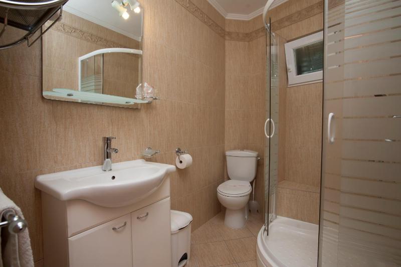 One-Bedroom Apartment with Balcony and Side Sea View image 3