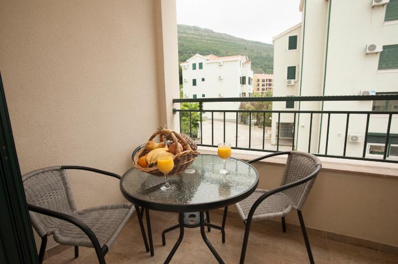 One-Bedroom Apartment with Balcony and Side Sea View image 4