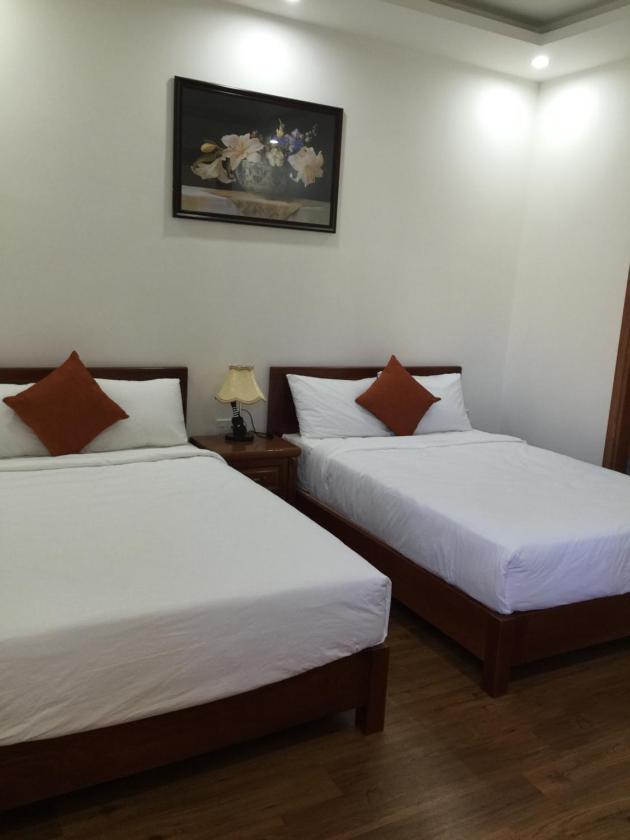 Phòng 4 Người có 2 Giường Đôi  Phòng 4 Người có 2 Giường Đôi