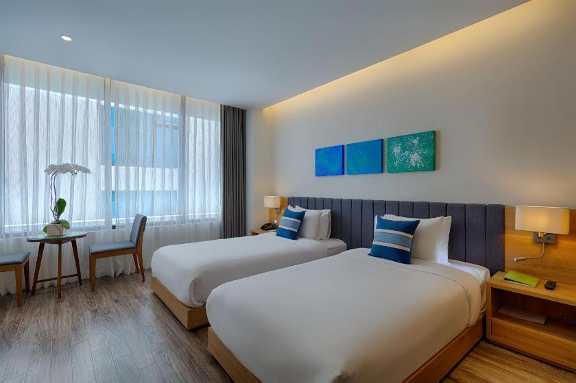 Phòng Deluxe Đôi hoặc 2 giường đơn nhìn ra 1 góc biển