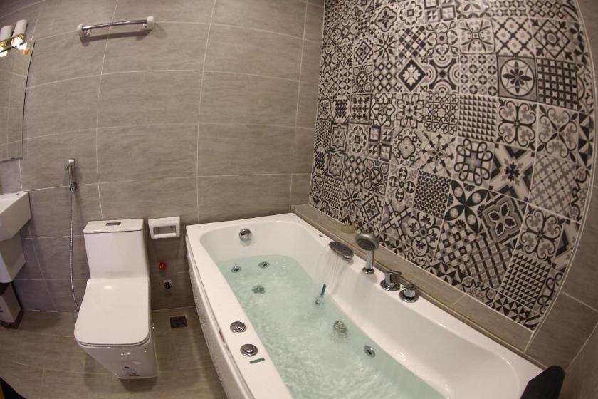 Phòng Deluxe giường đôi hoặc 2 giường đơn với Bồn tắm Spa Phòng Deluxe giường đôi hoặc 2 giường đơn với Bồn tắm Spa