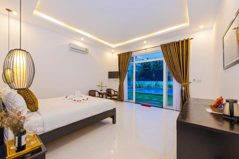 Phòng Junior Giường Đôi/2 Giường Đơn Hướng Hồ Bơi