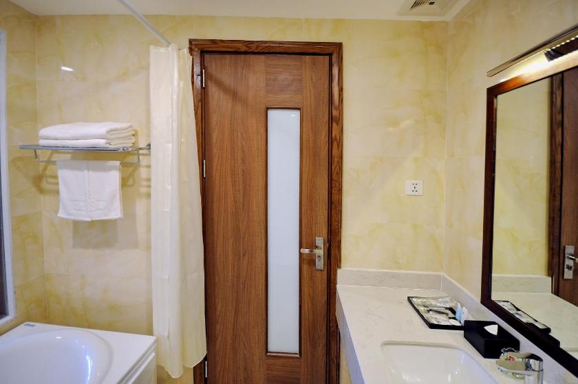 Phòng Deluxe Giường Đôi Với Ban Công và Tầm Nhìn Ra Biển Phòng Deluxe Giường Đôi Với Ban Công và Tầm Nhìn Ra Biển