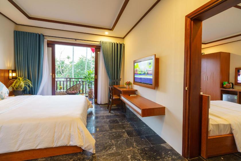 Phòng Deluxe Giường Đôi Nhìn Ra Hồ Bơi Phòng Deluxe Giường Đôi Nhìn Ra Hồ Bơi