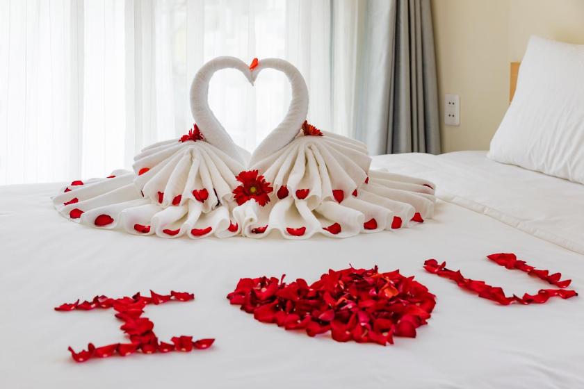 Phòng Deluxe Giường Đôi Nhìn Ra Biển Từ Phía Bên Cạnh Phòng Deluxe Giường Đôi Nhìn Ra Biển Từ Phía Bên Cạnh