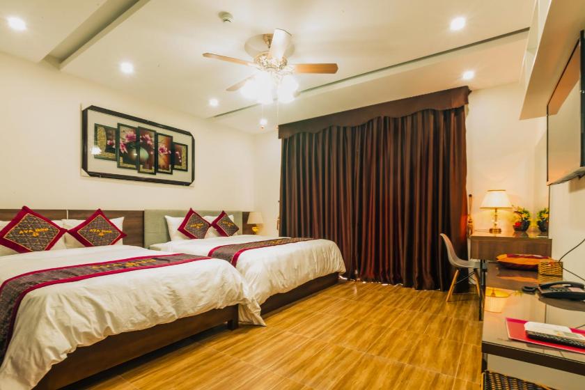 Phòng Deluxe Có 2 Giường Cỡ Queen Phòng Deluxe Có 2 Giường Cỡ Queen