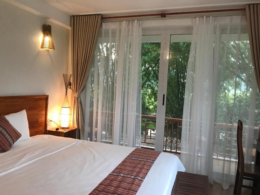 Phòng Deluxe (2 Người lớn + 1 Trẻ em)