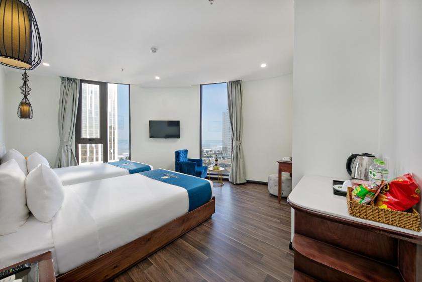 Suite Giường Đôi/2 Giường Đơn Nhìn Ra Một Góc Biển Có Bồn Tắm Suite Giường Đôi/2 Giường Đơn Nhìn Ra Một Góc Biển Có Bồn Tắm