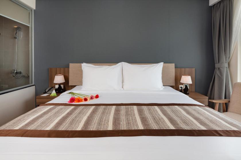 Phòng Deluxe Đôi hoặc 2 giường đơn nhìn ra 1 góc biển Phòng Deluxe Đôi hoặc 2 giường đơn nhìn ra 1 góc biển