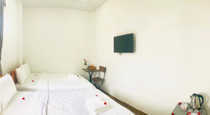 Phòng Deluxe 4 Người Phòng Deluxe 4 Người