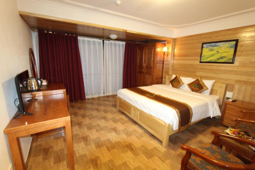 Phòng Deluxe Có Giường Cỡ Queen Phòng Deluxe Có Giường Cỡ Queen