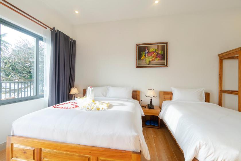 Phòng Deluxe cho 3 Người Phòng Deluxe cho 3 Người