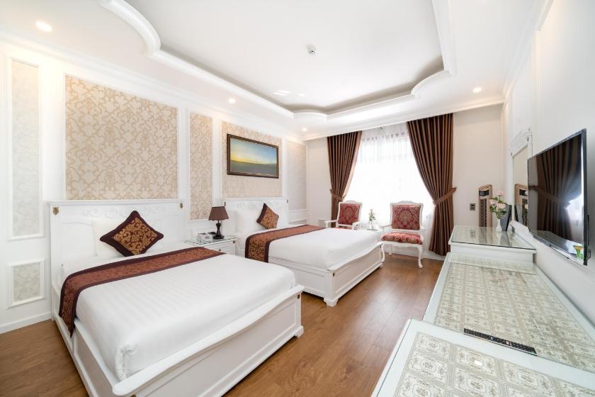 Phòng Deluxe cho 3 Người Phòng Deluxe cho 3 Người