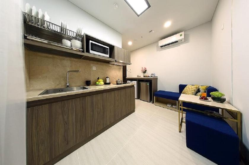 Suite Deluxe Có Giường Cỡ King Nhìn Ra Tòa Nhà Landmark 81 Suite Deluxe Có Giường Cỡ King Nhìn Ra Tòa Nhà Landmark 81