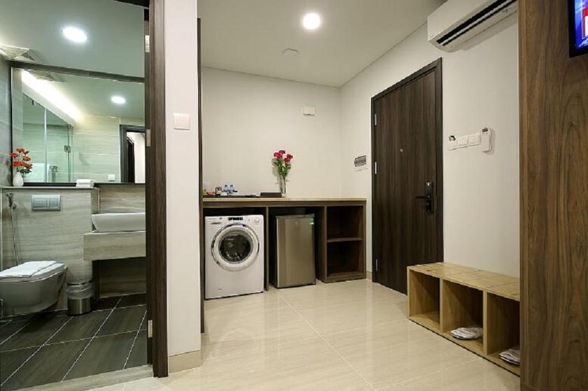 Suite Deluxe Có Giường Cỡ King Nhìn Ra Tòa Nhà Landmark 81 Suite Deluxe Có Giường Cỡ King Nhìn Ra Tòa Nhà Landmark 81