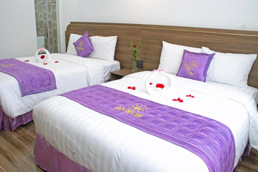 Phòng Deluxe Có 2 Giường Cỡ Queen Phòng Deluxe Có 2 Giường Cỡ Queen