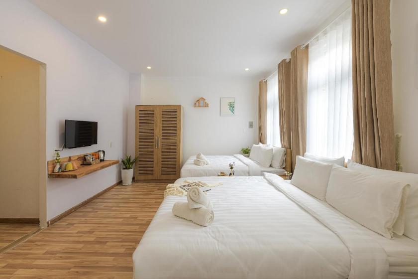 Phòng Deluxe 4 Người Phòng Deluxe 4 Người