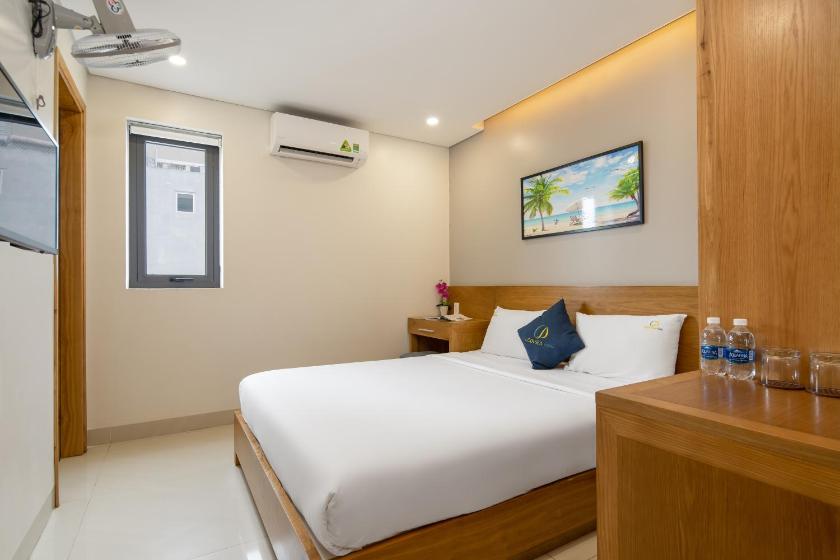 Phòng Deluxe (2 Người lớn + 1 Trẻ em) Phòng Deluxe (2 Người lớn + 1 Trẻ em)