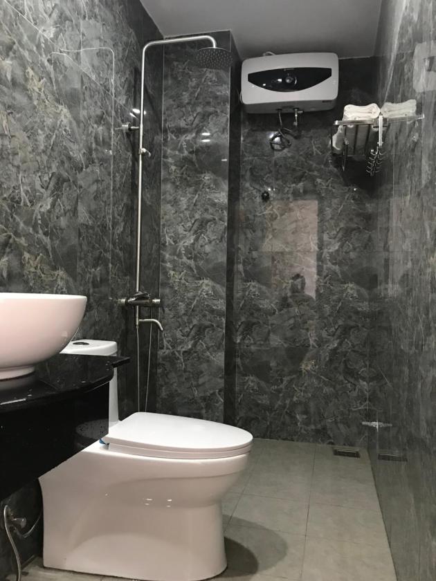 Phòng Deluxe Giường Đôi Với Ban Công và Tầm Nhìn Ra Biển Phòng Deluxe Giường Đôi Với Ban Công và Tầm Nhìn Ra Biển