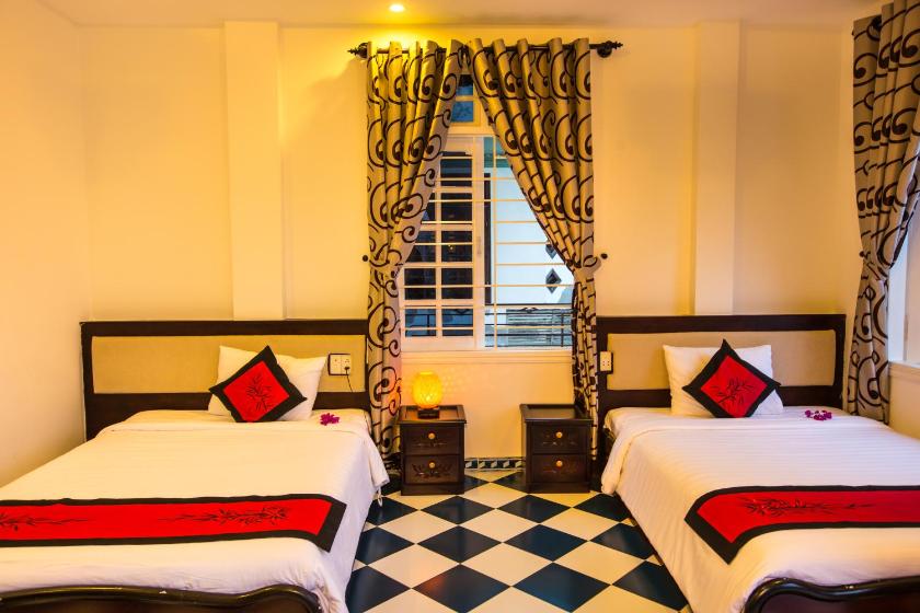 Phòng Deluxe cho 3 Người Phòng Deluxe cho 3 Người