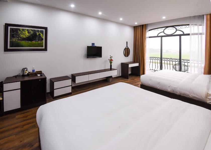 Phòng Deluxe Giường Đôi Có Ban Công Phòng Deluxe Giường Đôi Có Ban Công