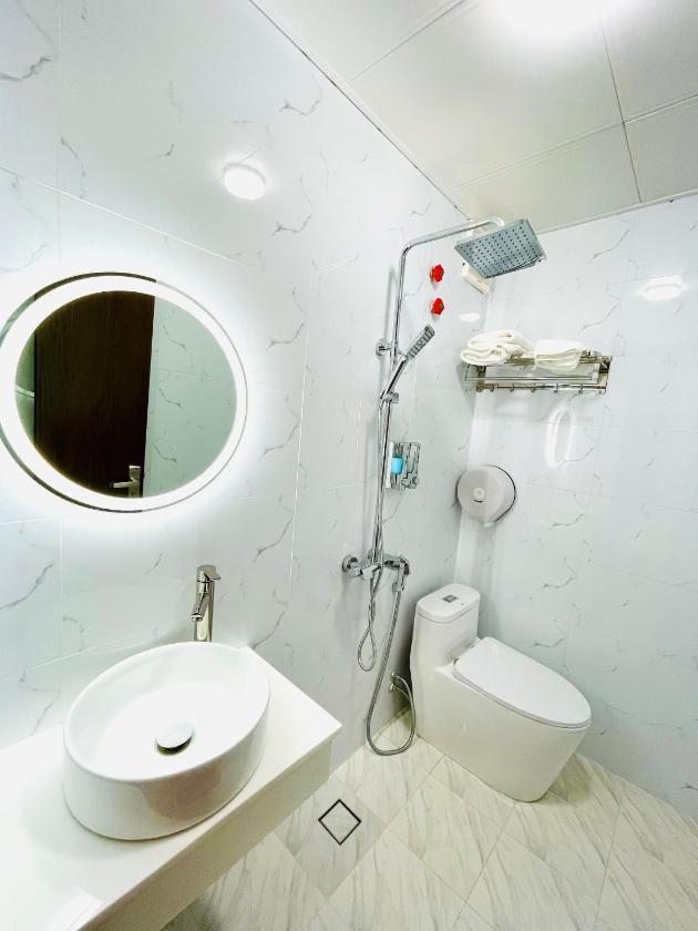 Phòng Deluxe (2 Người lớn + 1 Trẻ em)