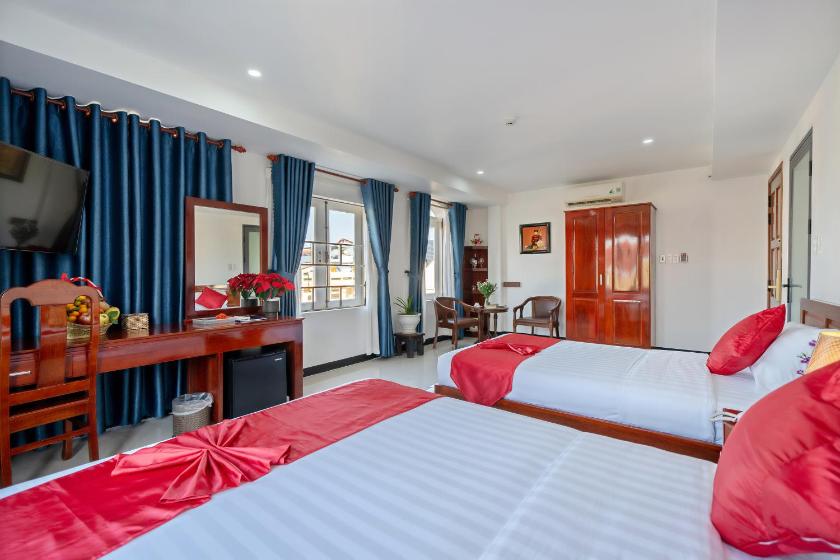 Phòng Deluxe cho 3 Người Phòng Deluxe cho 3 Người