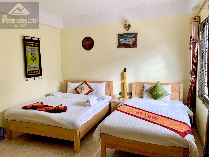 Phòng Giường đôi Deluxe (2 Người lớn + 1 Trẻ em) Phòng Giường đôi Deluxe (2 Người lớn + 1 Trẻ em)