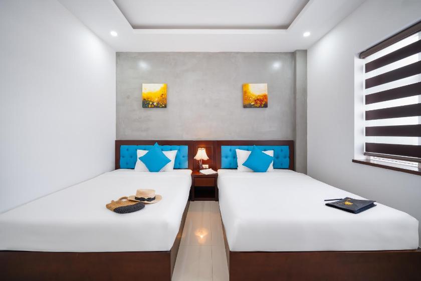 Phòng Deluxe cho 3 Người Phòng Deluxe cho 3 Người